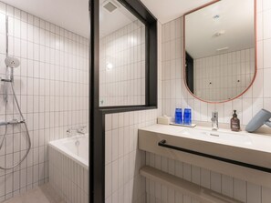 [Bunk bed room] Washstand area and bathroom (with bathtub and shower) *Not a hot spring