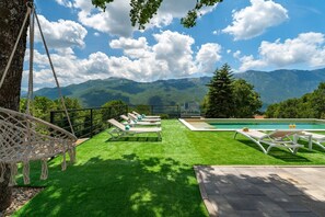 There is also a children's playground with a slide, trampoline, and table tennis