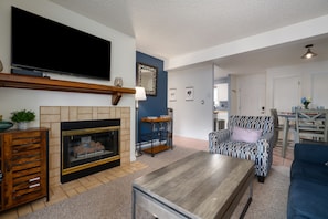 Living Area - Photo taken from the far end of the living room showing the entryway