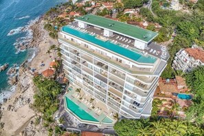 The iconic Orchid Tower.  Walking distance to Zona Romantica. in Conchas Chinas