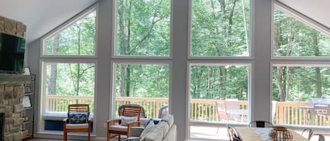 Vaulted great room brings the outside - inside!