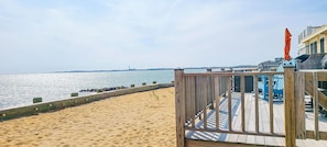 A breathtaking vista from your spacious deck overlooking the bay.