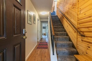 The view into the lower level of the home from the front door.