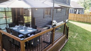 Dine outdoors, with a bit of cover from the Sun