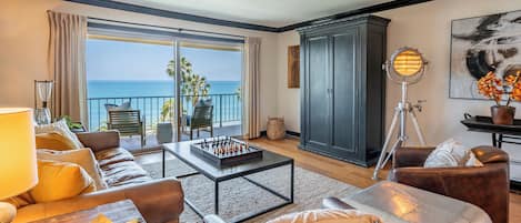 Living Room area with Balcony access and Ocean views.