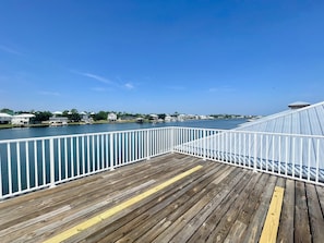 Sun deck over the neighborhood Marina - ONE MINUTE WALK from the house. BOAT SLIP #20 INCLUDED