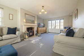 Saxon House, Harome: Large sitting room with wood burning stove