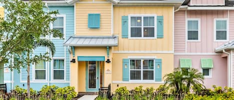 The warm yellow exterior is a sign of what you’ll find inside this condo!