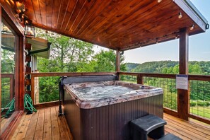 Relax your muscles by immersing yourself in the large 6 person jetted hot tub