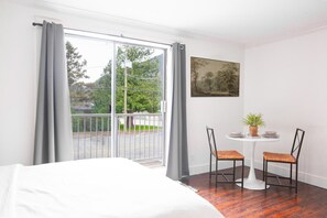 There is a two person dining table to enjoy a meal or work from home.