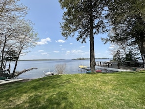 Watfront with a sandy gradual entry, a dock for swimming & a mooring for a boat!