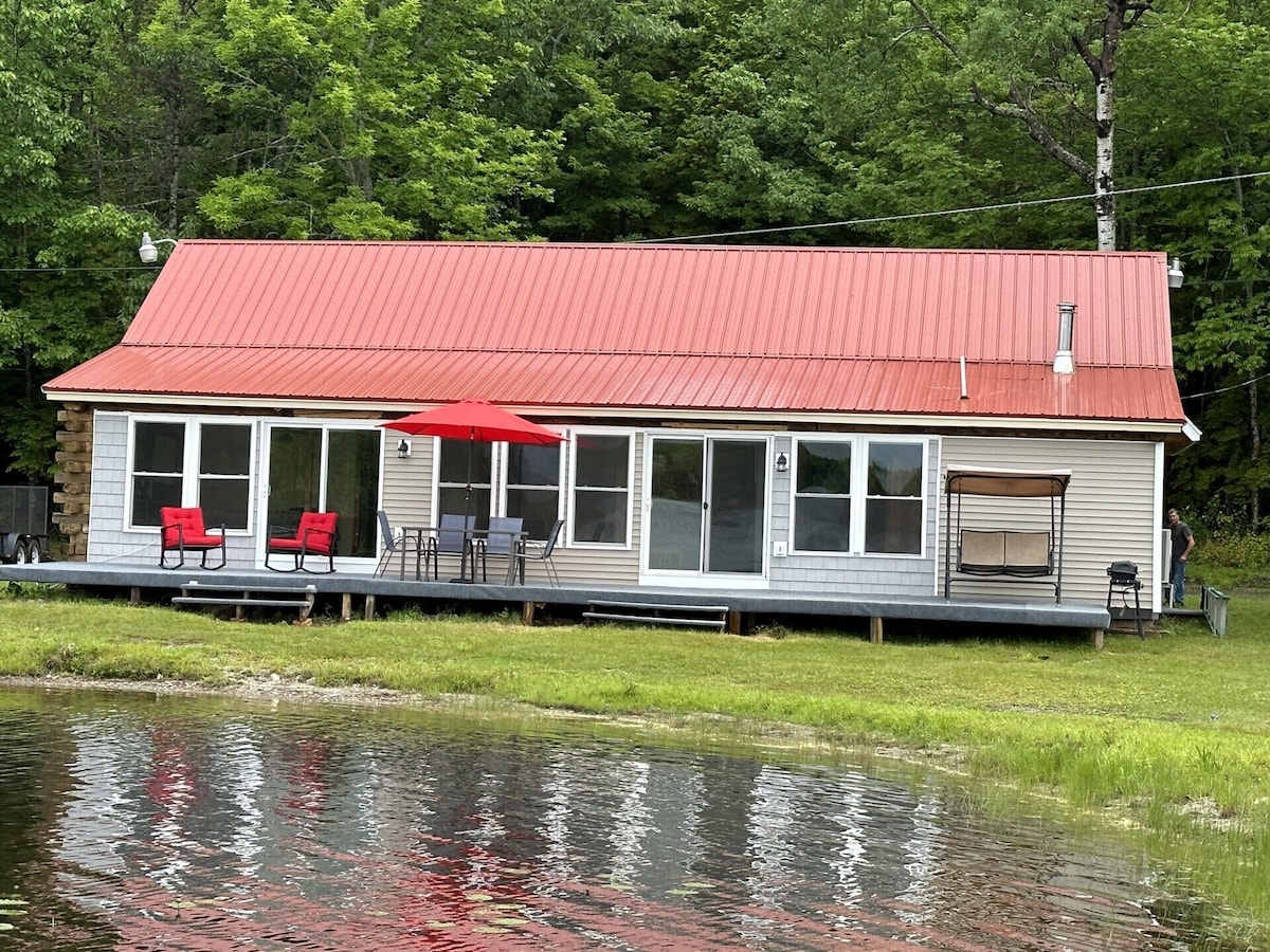 Beautiful private beach area within steps from the modern updated log home