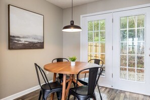 Dining room set for four! This leads you out to the rear private hot tub patio!