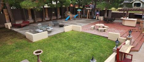 Patio w/ enclosed yard and kids' area
