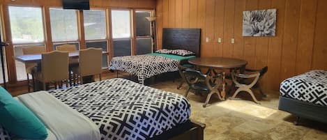 3 Queen Size Beds and 2 Tables in Loft 2