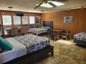 3 Queen Size Beds and 2 Tables in Loft 2