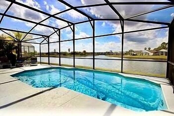 How is this for a stunning pool with lake view!
