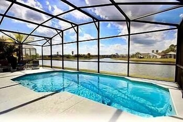How is this for a stunning pool with lake view!