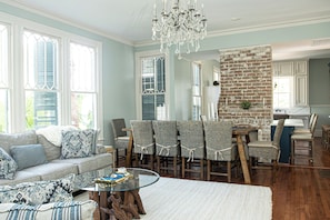 Spacious great room including exposure of original 1891 brick fireplace