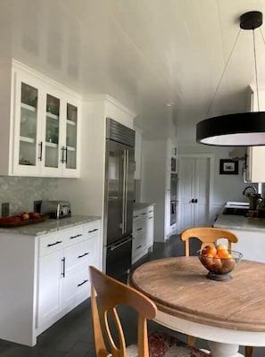 Chef's kitchen with subzero fridge, double oven