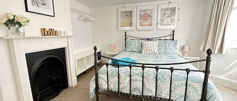 Comfy king sized bed, hanging space