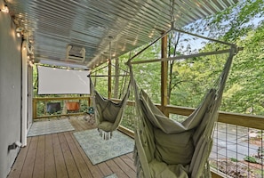 Hanging chairs and hammocks available for relaxing on the middle deck! 