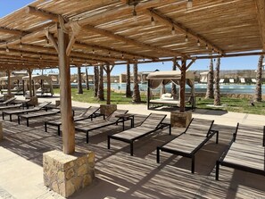 Large poolside shaded area to enjoy out of the summer sun