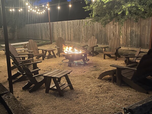Relax in the Adirondack chairs by the fire pit!