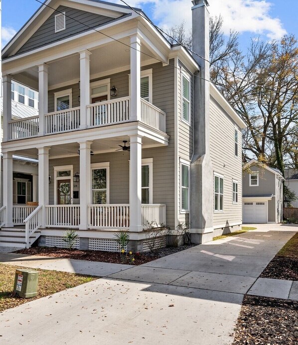 Main house in front of carriage house