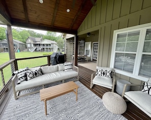 Covered porch and outdoor dining area.
