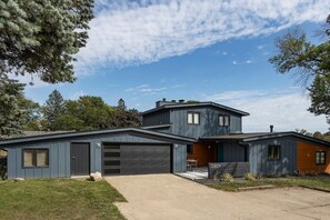 Side view of the home showcasing the modern architecture.