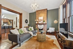The remodeled living room of the bottom unit. 