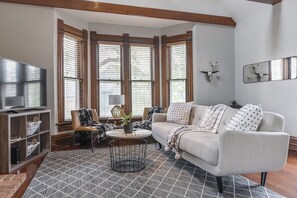 The living room of the upstairs portion of the duplex. 