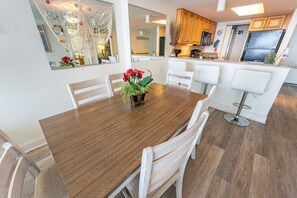 - Whether it’s a quick bite or a full-course meal, this inviting dining space is ready for you - A stylish dining setup with comfortable seating and an open layout - The perfect blend of warmth, functionality, and a touch of coastal charm