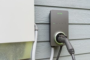EV Charger located outside in the driveway to recharge your vehicle from the convenience of the cabin.