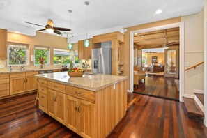 Kitchen, entry way, and great room.