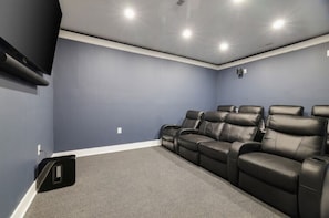 Home theater with tray ceiling uplighting and state of the art SONOS sound