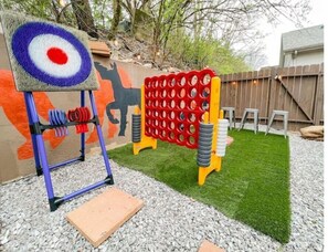 Life-sized yard games including family friendly Axe throwing!