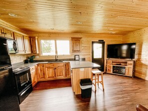 Full kitchen and living area in The Bear Cabin (1)
