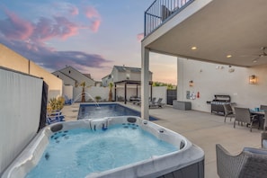 Unwind in the luxurious hot tub next to the pool, where soothing jets and warm water create the perfect spot to relax under the stars.