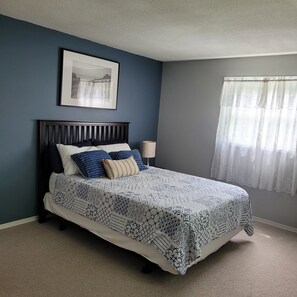 Master bedroom with queen bed