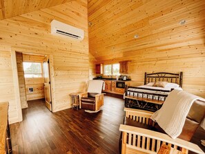 The Gobbler Cabin studio view of bed and kitchenette