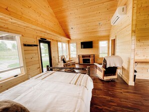 The Gobbler Cabin studio view of bed and living area