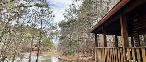 Redbud Retreat cabin located on Beavers Bend Log Cabins 40 private acres shared with 6 other cabins. We have four shared catch &amp; release ponds for guests to use who are staying with us.