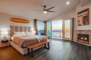 Primary Bedroom: ocean front deck, fireplace, TV, & ensuite ba (tub + shower)