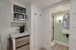 Cozy tiny cottage kitchenette stocked with essentials | prepare meals with ease, from morning coffee to dinner, perfect for couples or solo travelers seeking a relaxing nature escape