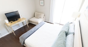 The bedroom has a private balcony