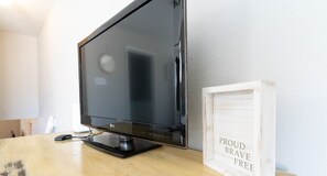 Smart TV and clothes storage