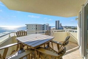 Great Patio, actually 2 spots.  Poly Wood Chairs are very durable and comfortable. NOTE they are balcony height for a great view, caution for young children.