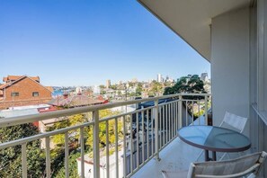 Private balcony with views towards the harbour and Harbour Bridge